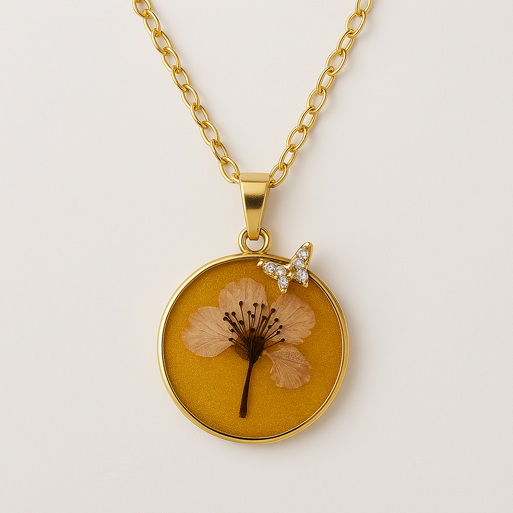 Close-up of delicate real cherry blossom detail in handmade Irish pendant from Botanic Gems.