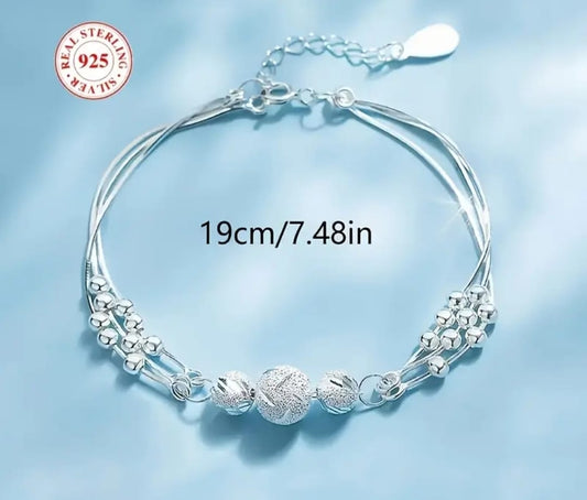 Polished silver bracelet, a modern and versatile accessory from Botanic Gems Jewelry's collection