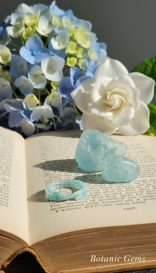 Faceted aquamarine ring close up translucent blue gemstone