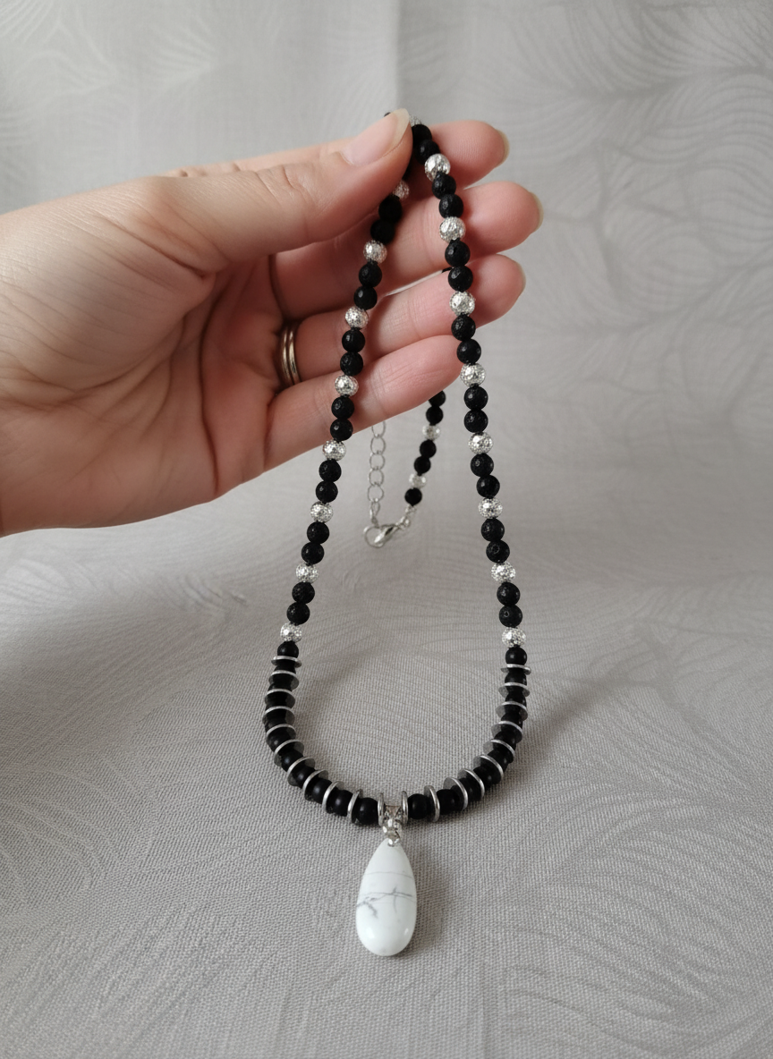 "Handcrafted black lava stone and howlite teardrop necklace - 35cm gemstone jewelry"
