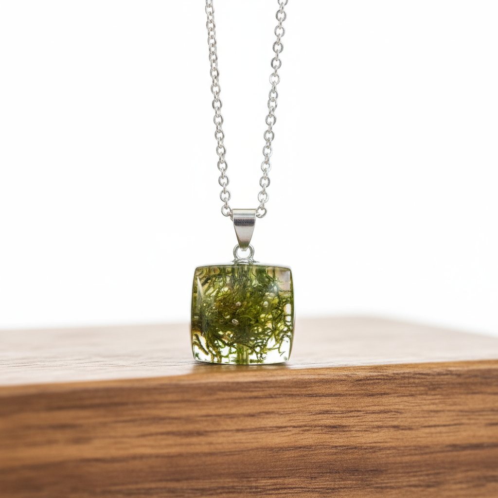 Olive green resin square pendant necklace with real moss and silver chain on wood"