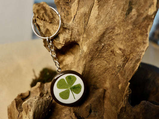 Handmade resin keyring with real four-leaf clover, an Irish good luck keepsake by Botanic Gems Jewelry.