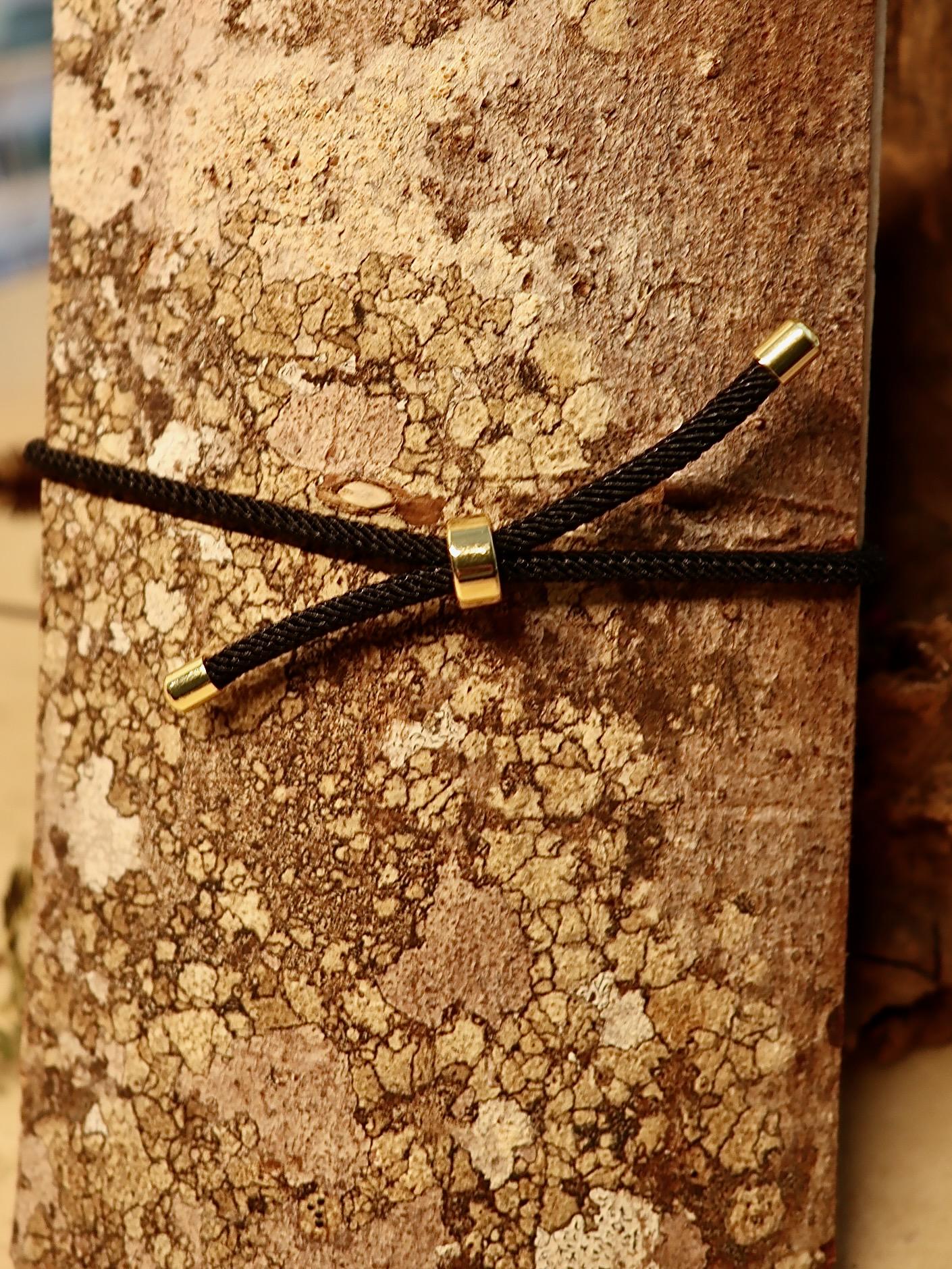 Handmade bracelet with real Irish ferns, displayed with other botanical jewelry from Botanic Gems collection.