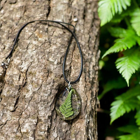 Close-up of delicate real Irish fern detail preserved in clear resin, handmade by Botanic Gems Jewelry