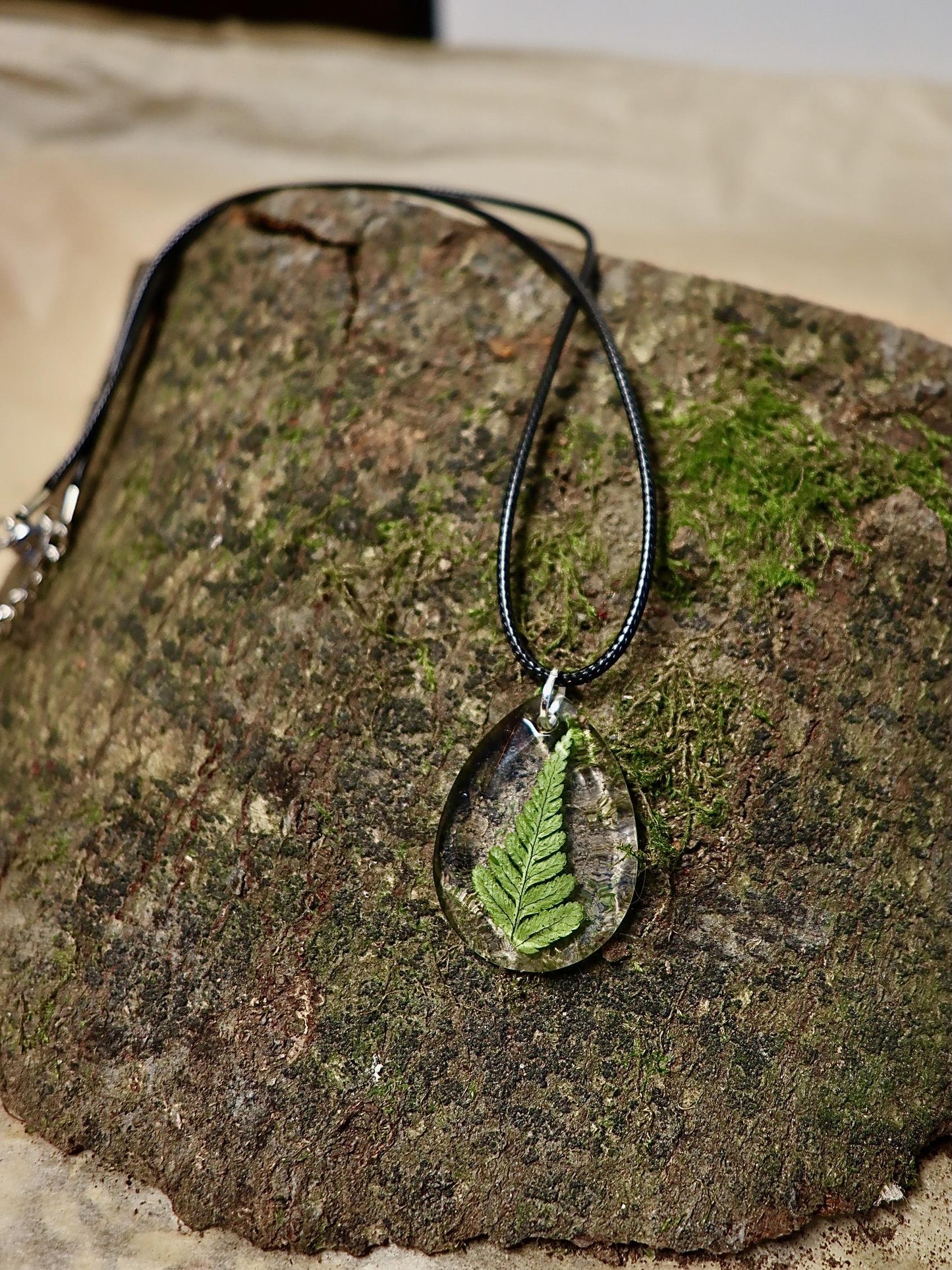Handmade real Irish fern resin jewelry displayed with Botanic Gems Jewelry branded packaging