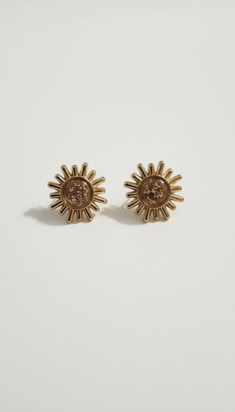  handcrafted with stainless steel, golden resin, and delicate white Anise Queen flowers.