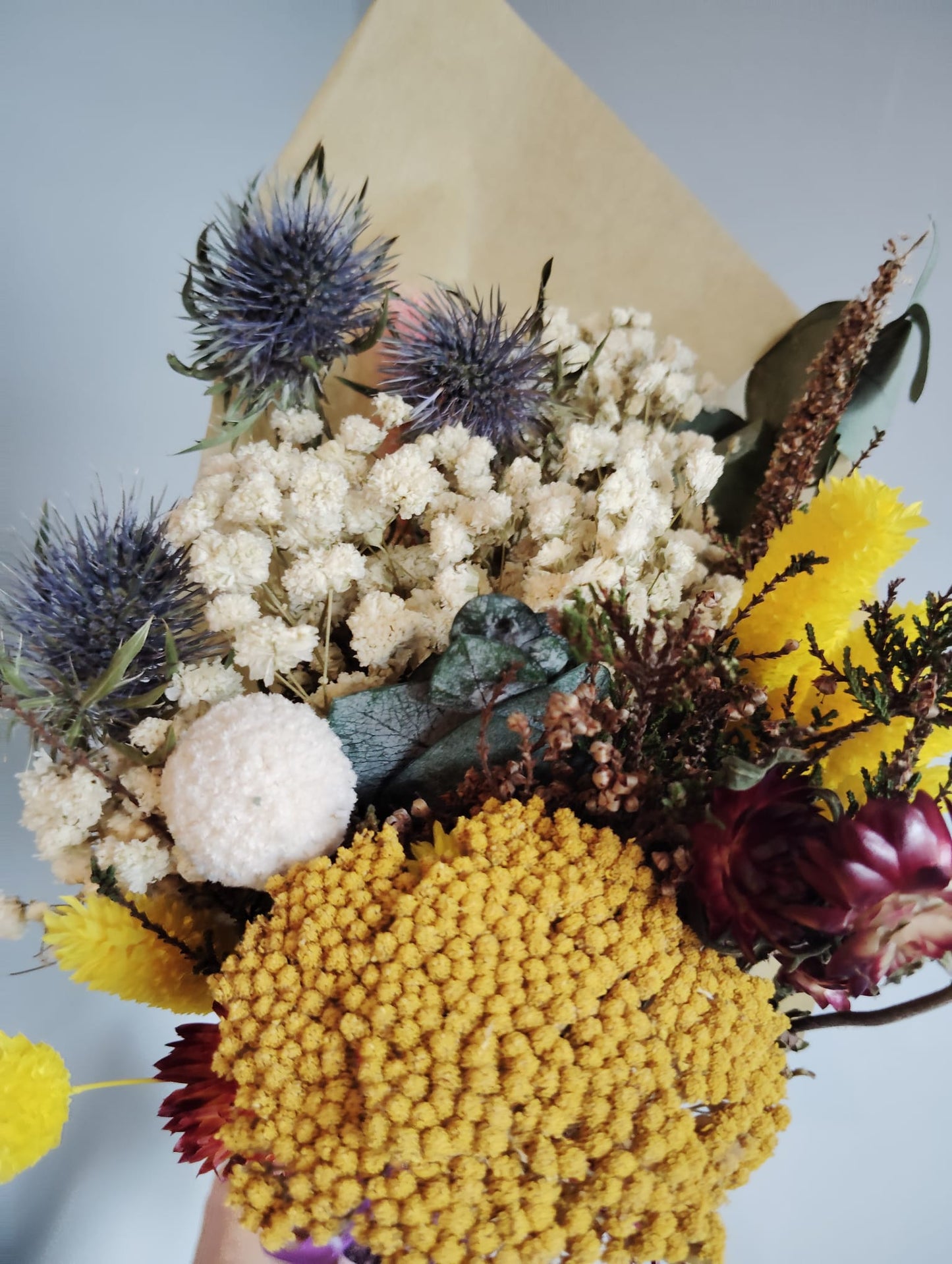 Large textured dried flower bouquet with yellow and blue accents, safely packed for nationwide delivery in Ireland.