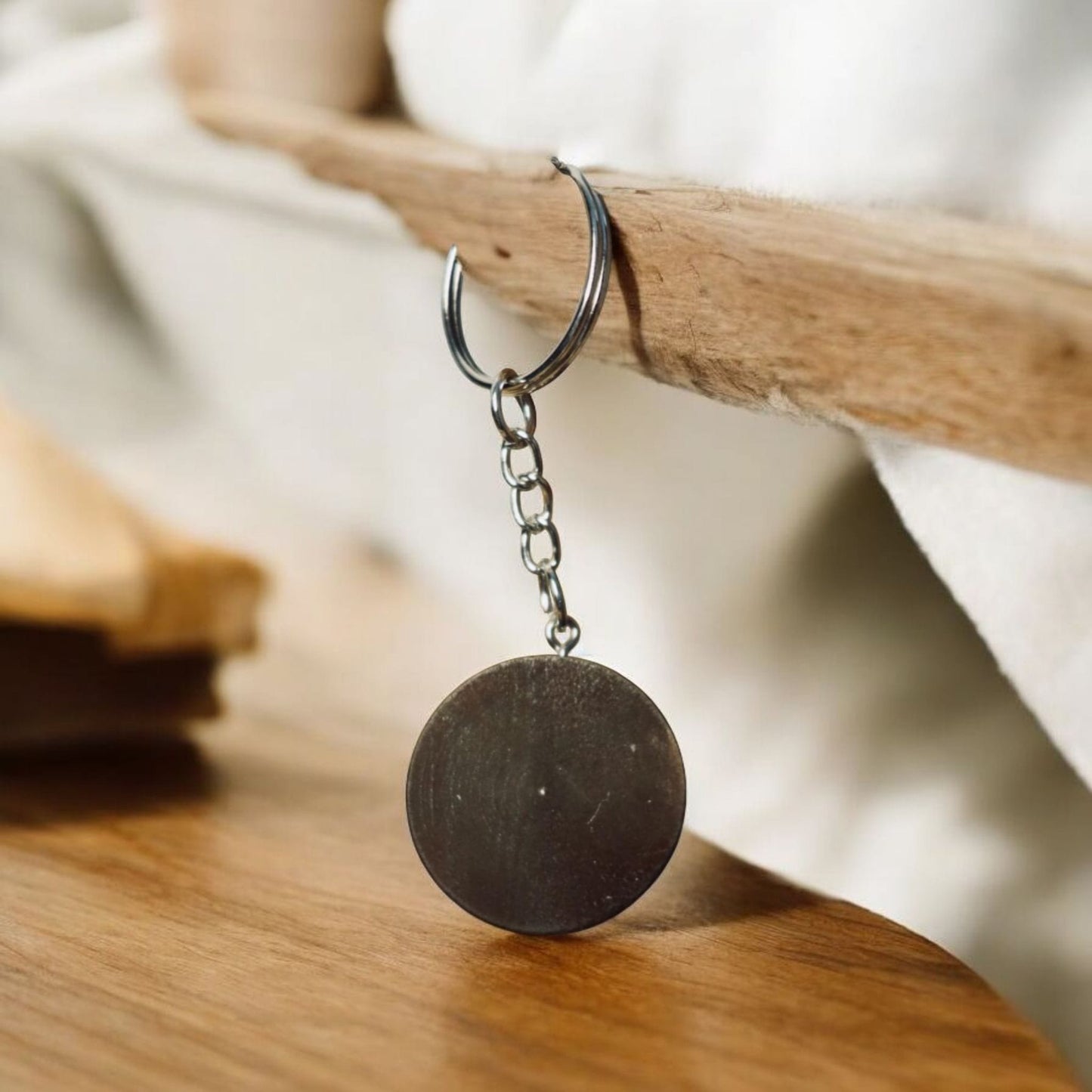 Close-up of a real four-leaf clover preserved in resin, showcasing unique details of the handmade Irish keyring