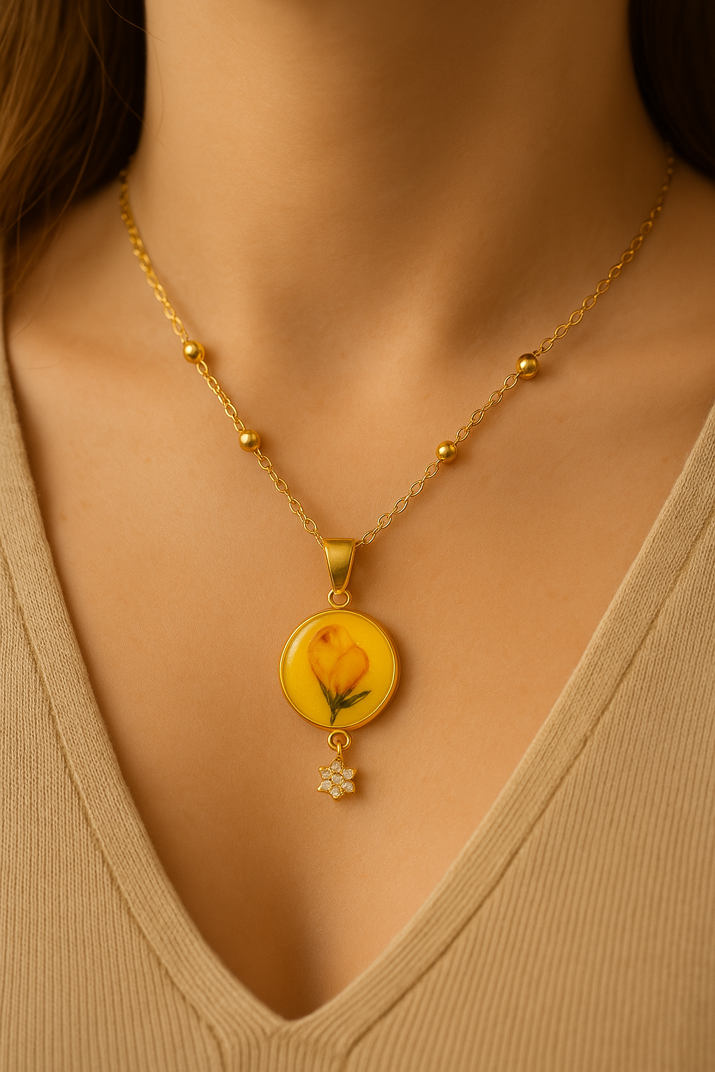 Yellow archangel flower pendant worn on necklace, showing elegant fit, Irish jewelry by Botanic Gems Jewelry
